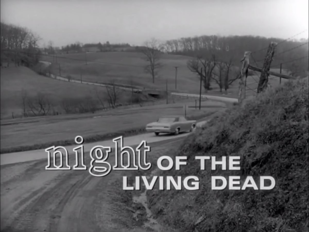 Title card of the classic nineteen sixty-eight George Romero film Night of the Living Dead, arguably the most influential zombie movie ever, depicting in black and white one of the movie's first scenes of a large American sedan rolling along a curvy road in the hilly western Pennsylvania countryside.
