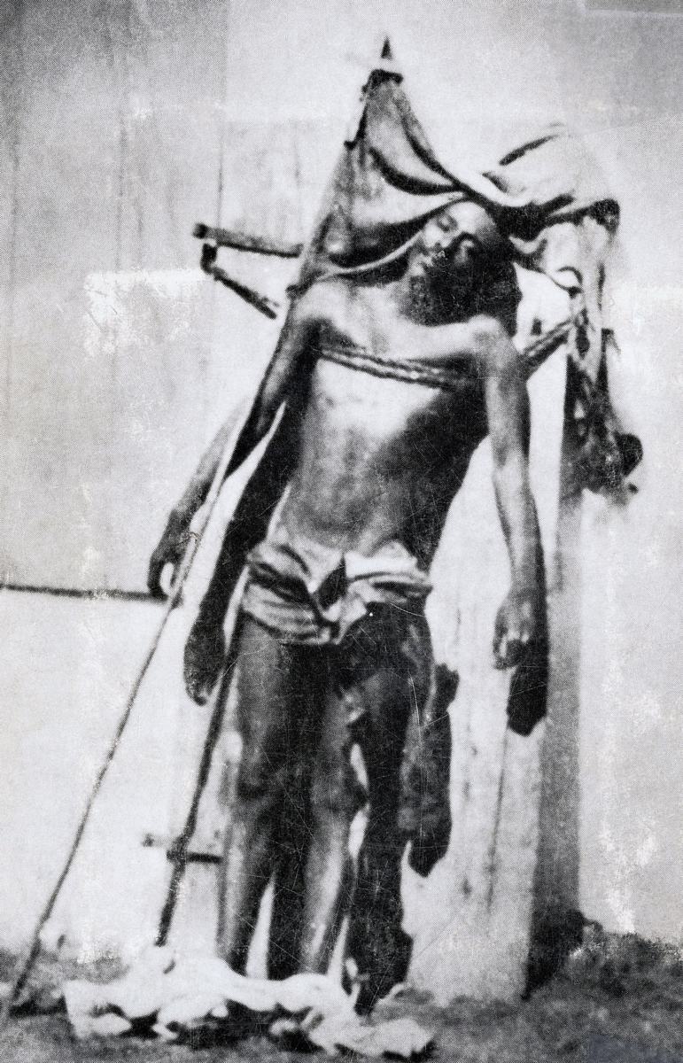 Black and white photograph of Charlemagne Peralte, leader of resistance against the U.S. Occupation of Haiti, executed by American marines. Hinche, Haiti, nineteen nineteen.