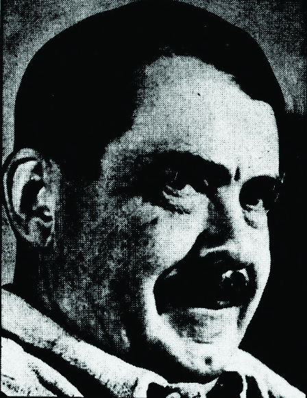 Nineteen thirty-eight black and white photograph of William Seabrook, the American author and occultist who wrote The Magic Island, one of the first instances of the zombie being introduced to an American readership. Photo is a head shot, and his black hair and moustache and smirk make him look a bit menacing.